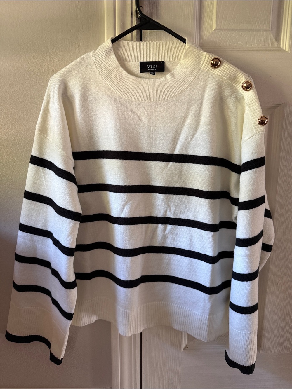 Vici White Sweater with Black Stripes & Gold Shoulder Buttons